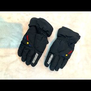 Gordini winter gloves.  Black with adjustable Velcro close wrist straps.